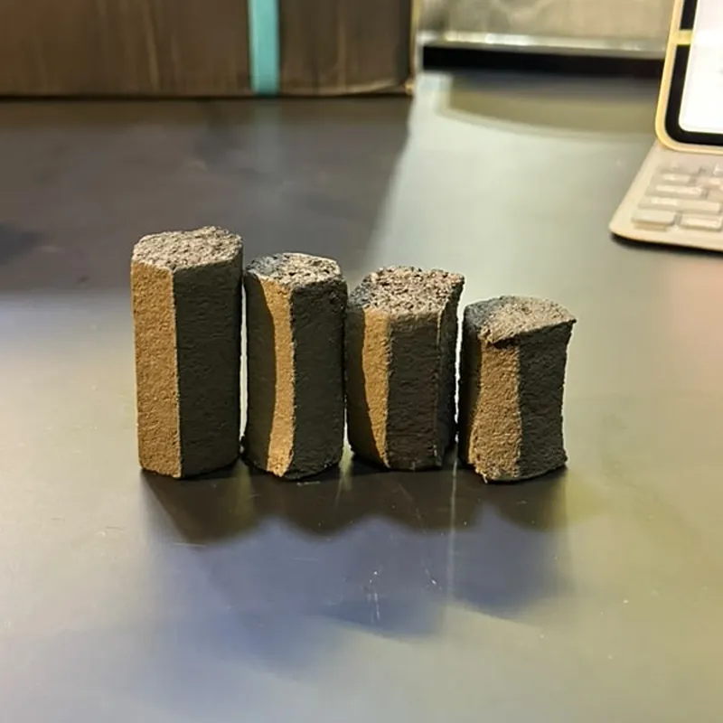 Pressed cylindrical Minerhex charcoal briquettes